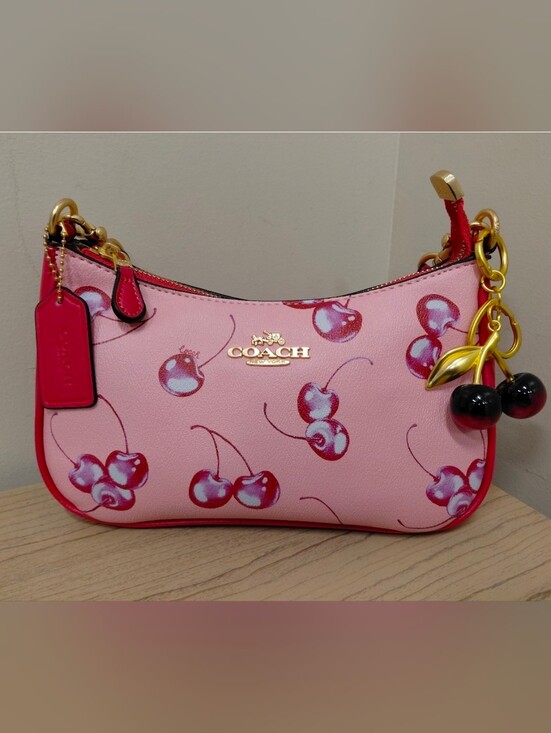Coach Handbags - Coach Pink Cherry-Print Mini Shoulder Bag with Gold Hardware